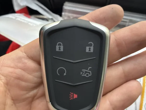 Replacement Cadillac smart key fob programmed in the locksmith van