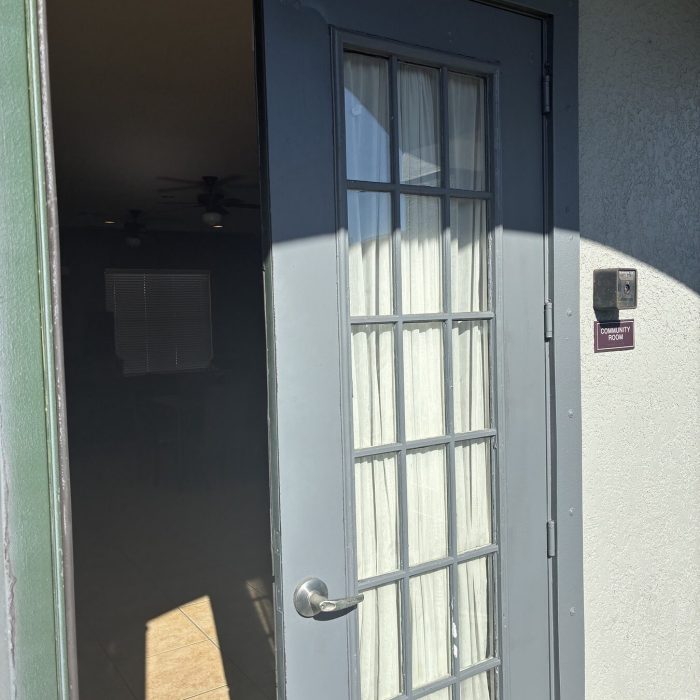 Access control card reader installed at a commercial entry