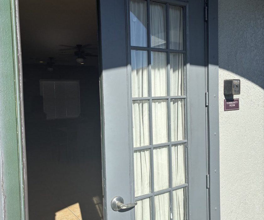 Access control card reader installed at a commercial entry