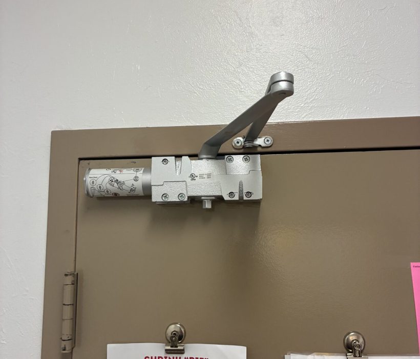 Door closer installed on a commercial back of house door