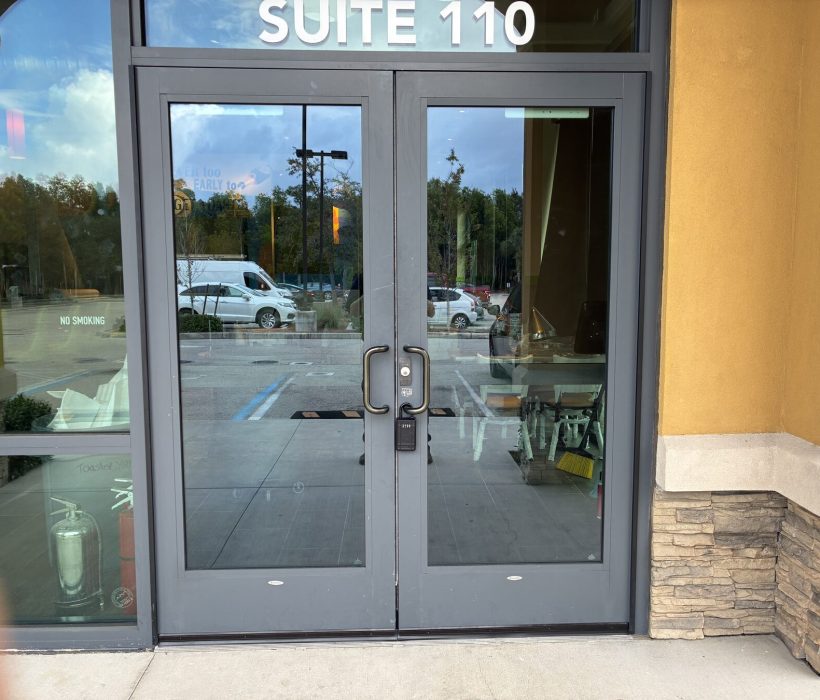 Commercial storefront double doors secured for a local business