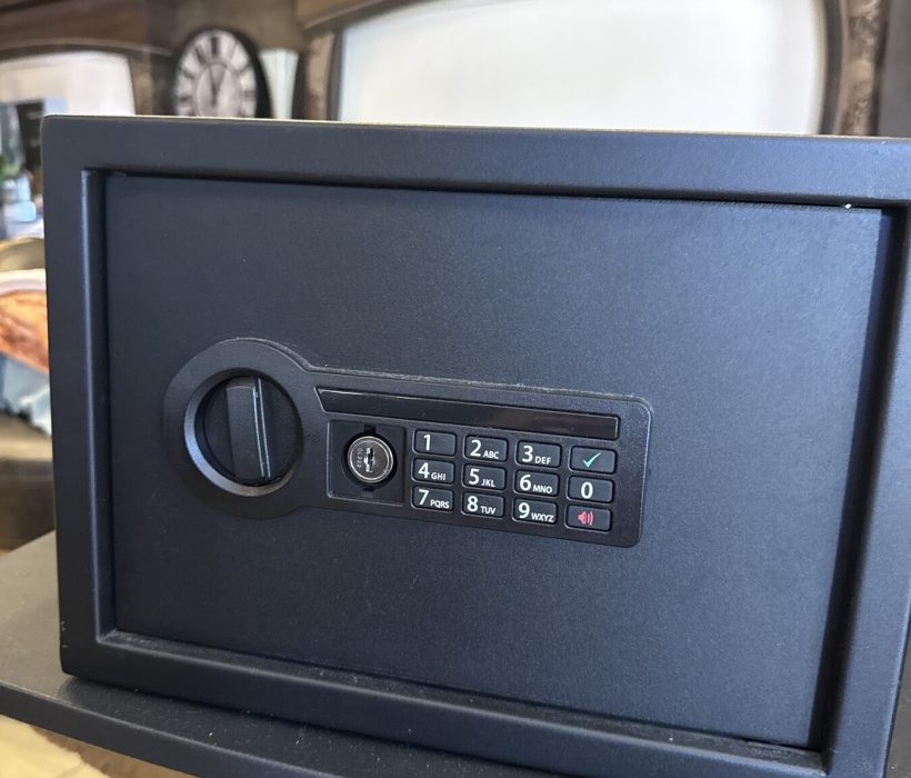 Electronic keypad safe installed and set up for the customer