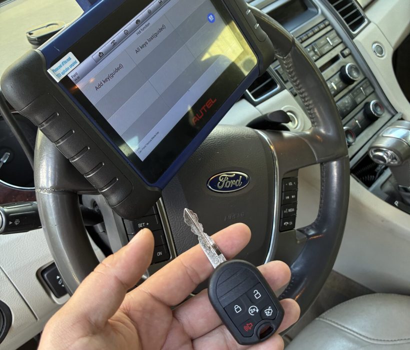 Ford key being programmed with a professional diagnostic tablet