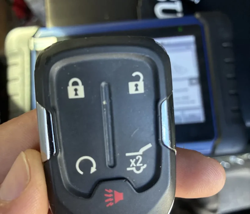 GMC key fob being programmed with professional diagnostic equipment
