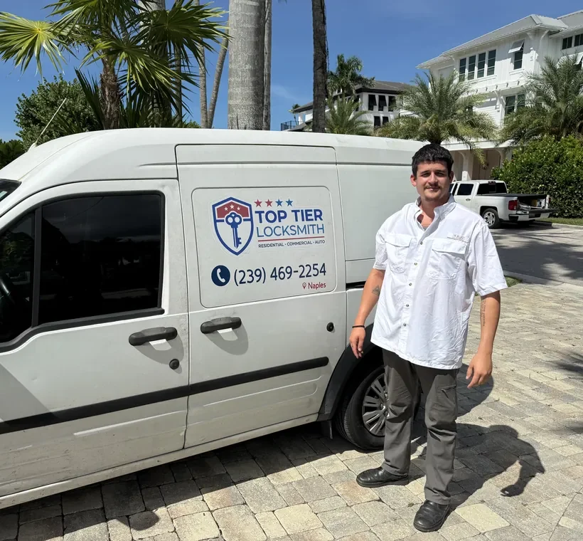 Josh, owner of Top Tier Locksmith, beside his mobile locksmith van in Naples, Florida