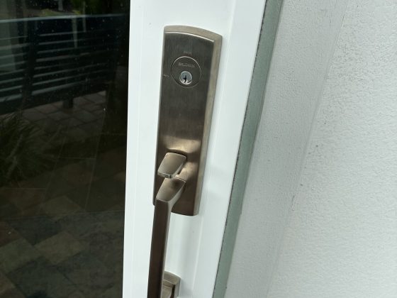 Commercial storefront glass door fitted with a new lock
